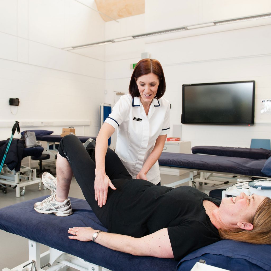 Eve Scarle, Physiotherapy lecturer performing exercises