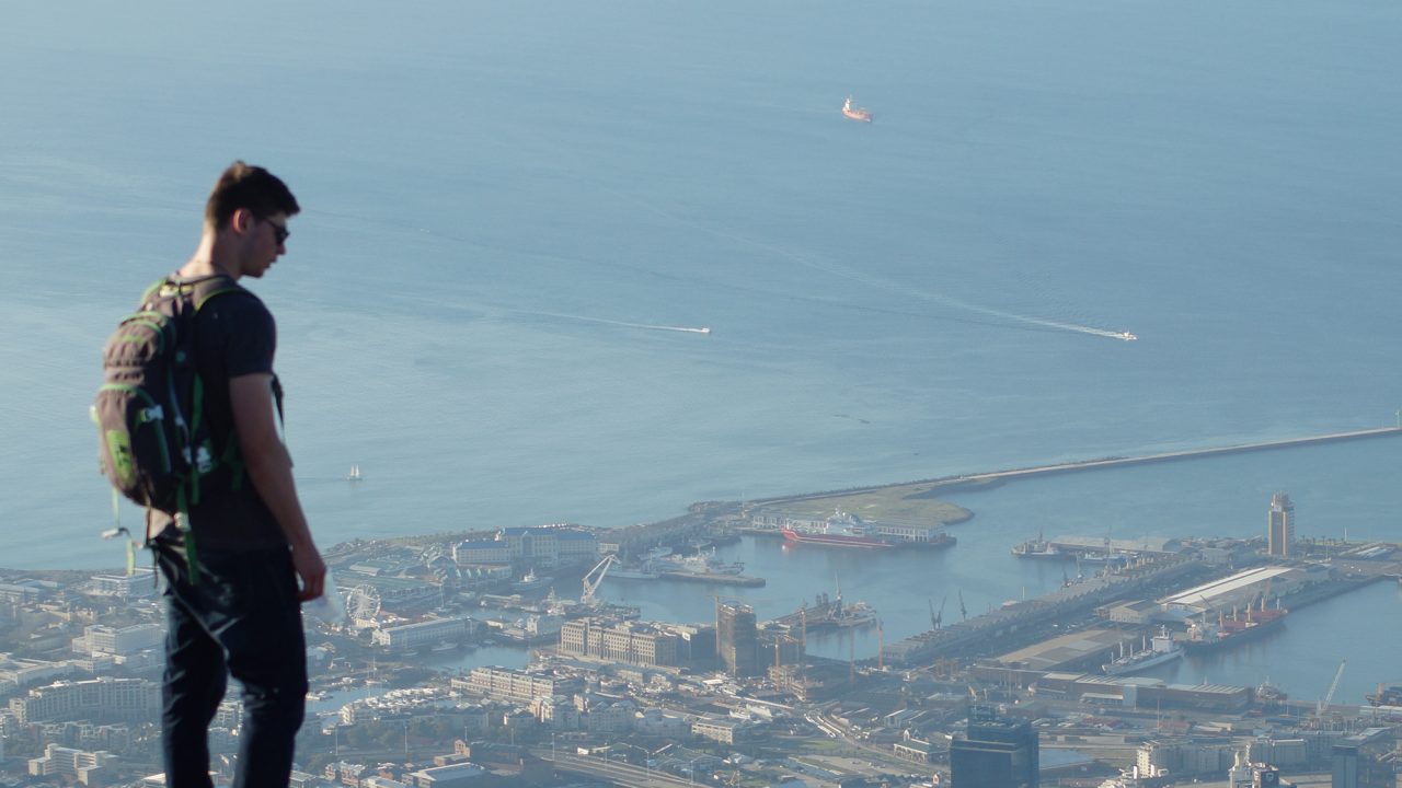 Student on Geography course overlooking city in South Africa whilst on field trip
