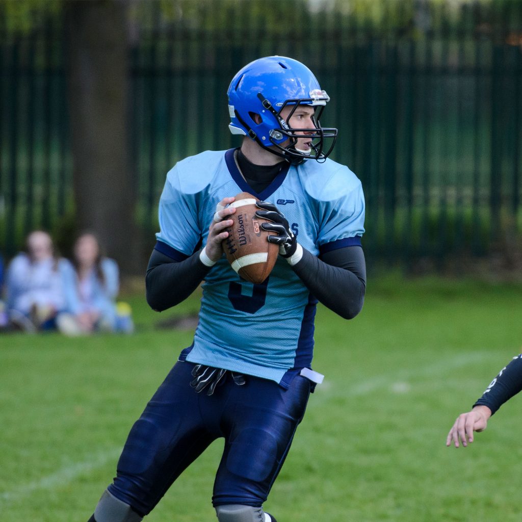 Student playing American Football