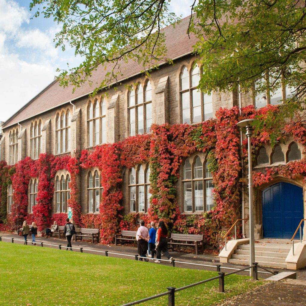 Francis Close Hall covered in autumn leaves