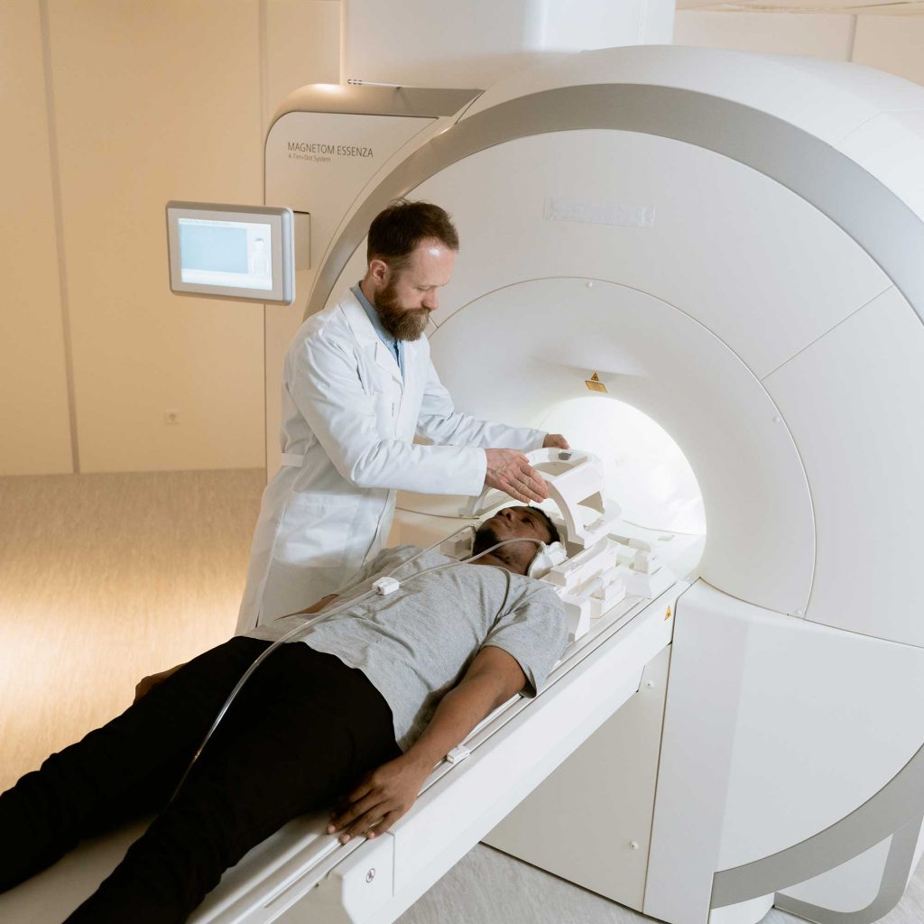Diagnostic Radiographer using imaging equipment