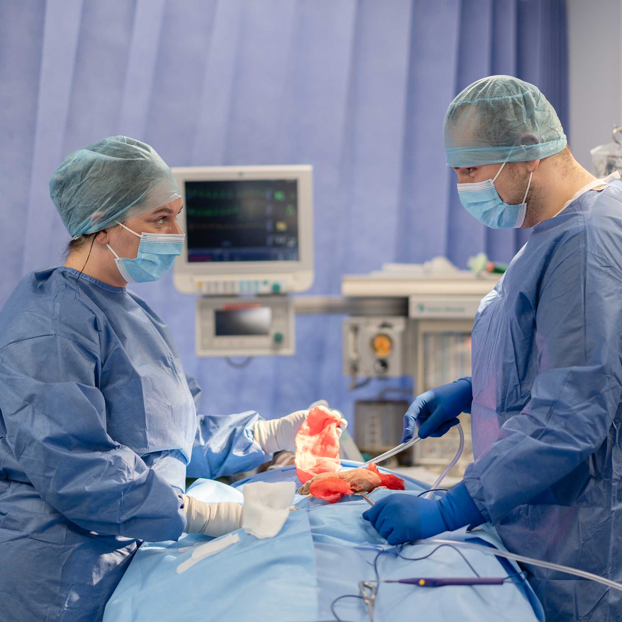 Two students conduct a simulated operation on the University's mock ward.