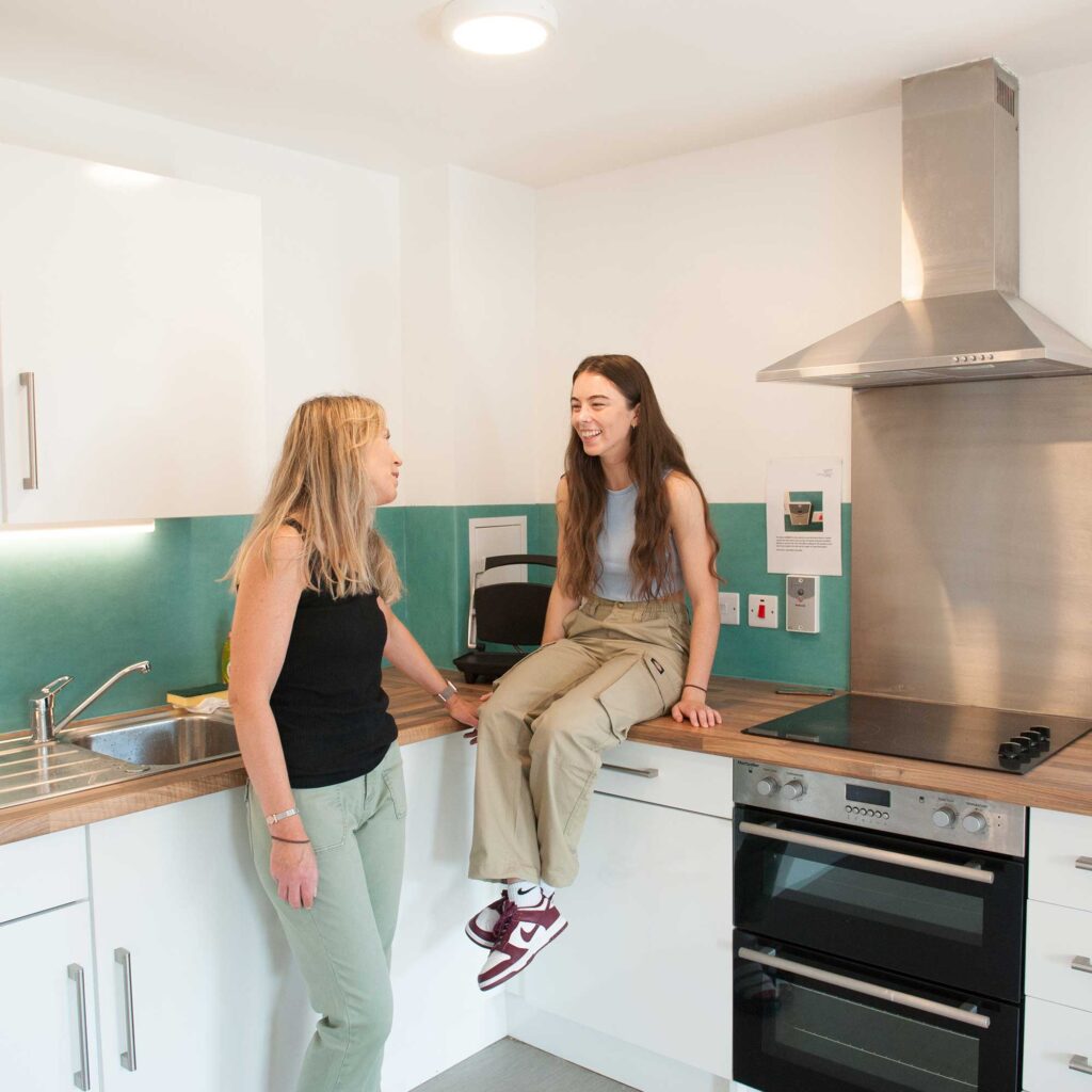 Two female student shat in one of the halls kitchens.