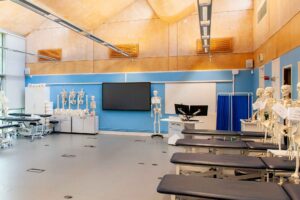 Physio Rooms based at Oxstalls with beds and model skeletons.
