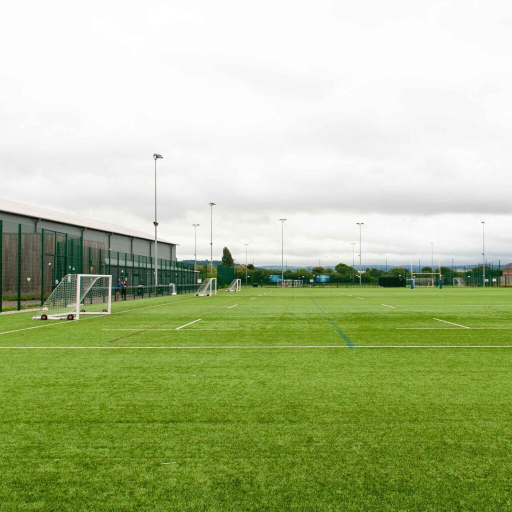 3G pitches at Oxstalls Sports Arena campuses with goals set up.
