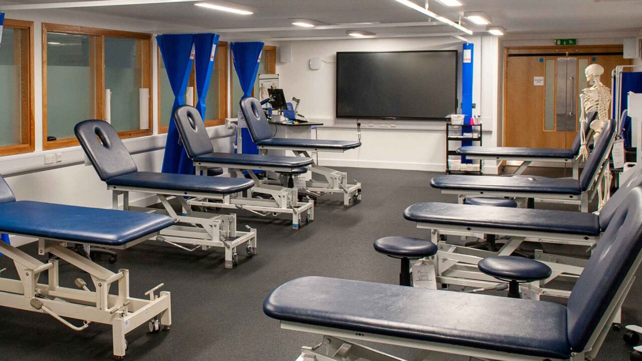 Physio Rooms based at Oxstalls with beds and model skeletons.
