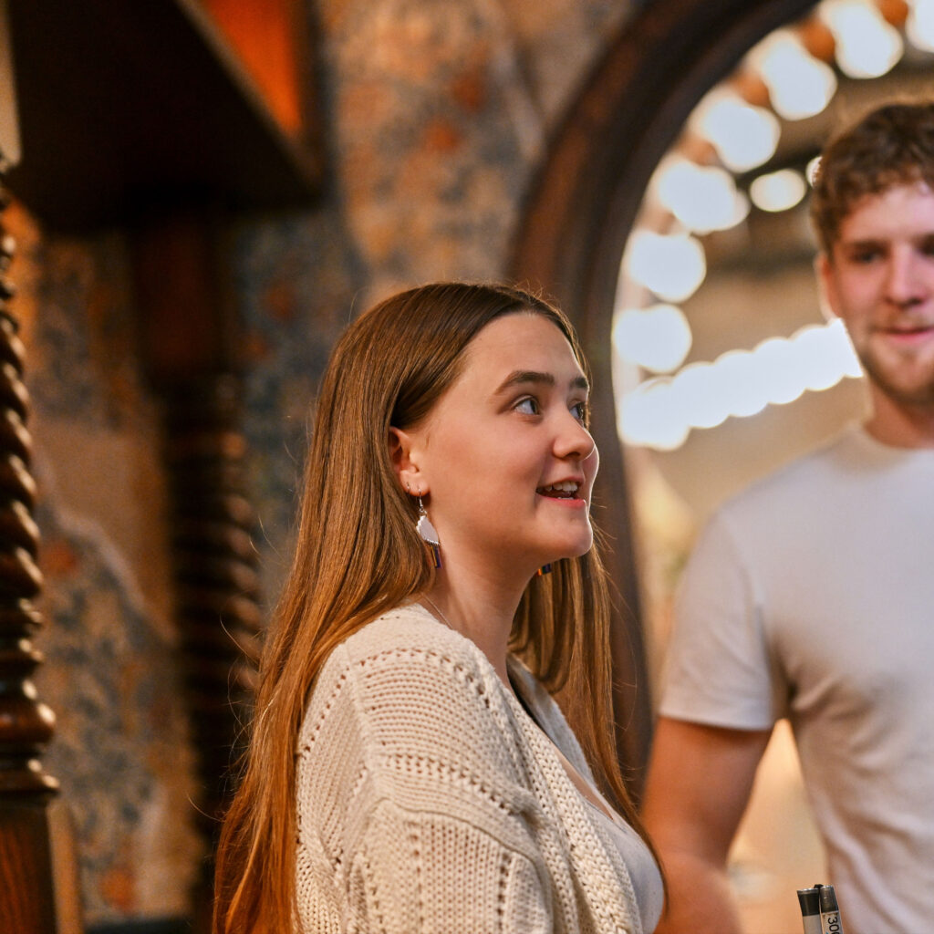 Students talking in bar