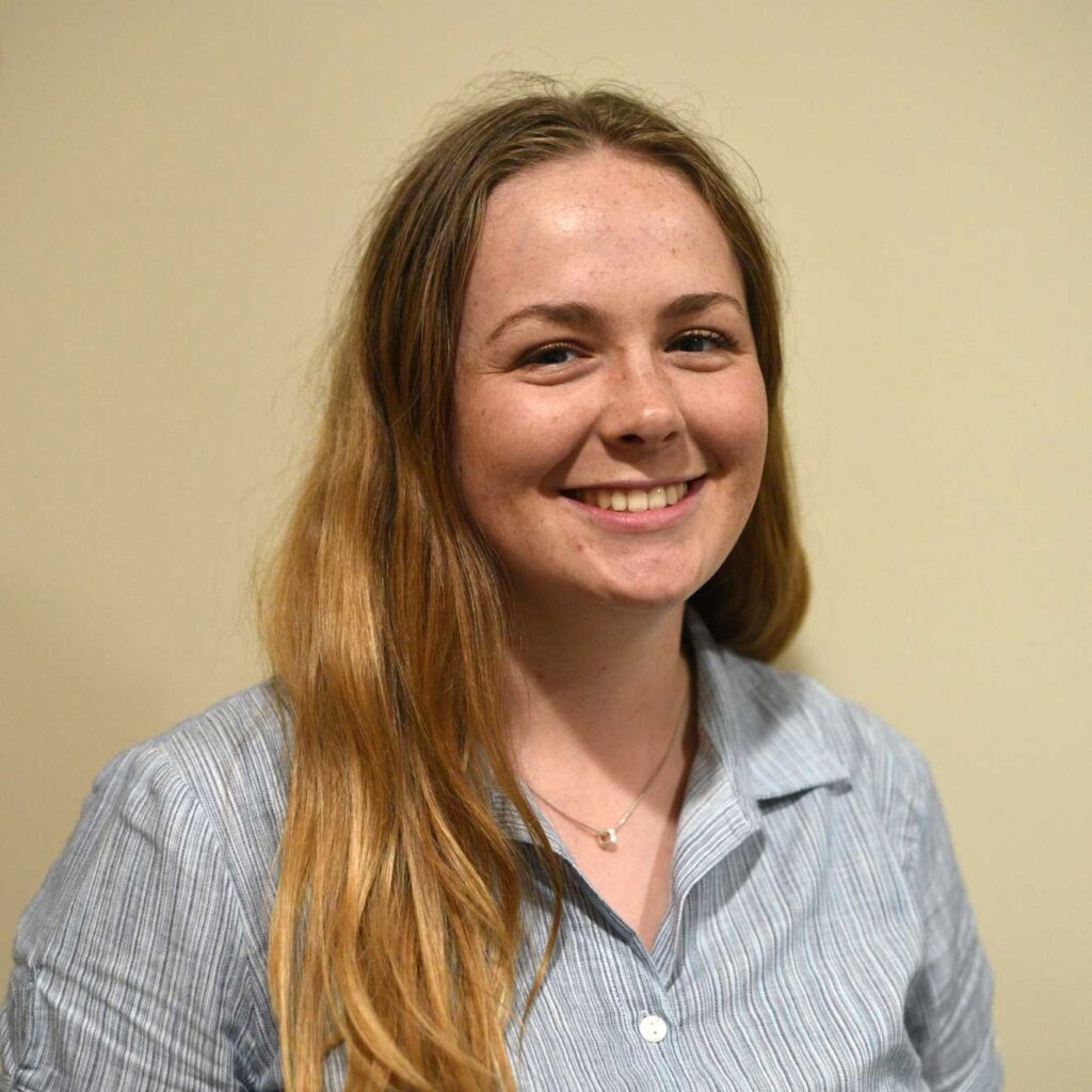 head and shoulders photo of Ellie smiling